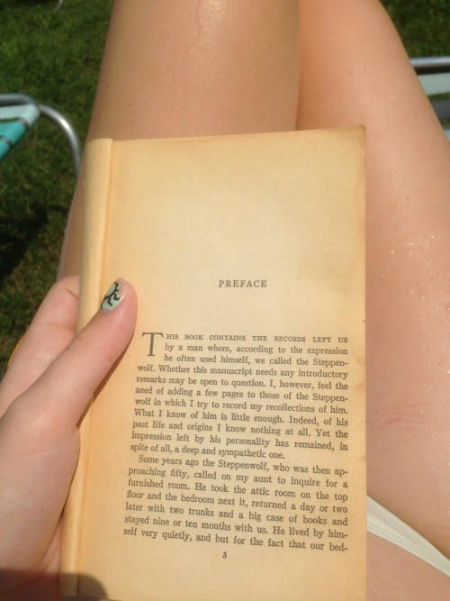 hermannhesse:  flowsweetlywoodnote:  Squeezing in some quality Hermann Hesse time  SHOUT OUT TO ERIN KUHN  reading steppenwolf in a bikini, you go girl!  