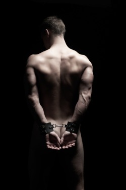 mistress-mary:  classyfemdomuniverse:  A classy female domination blog  Handcuffs, muscular back, a man ready to submit… Well, I accept.  