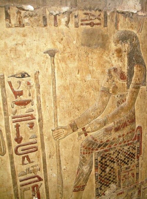  the Goddess Hathor enthroned, holding the ‘Ankh’ and the papyrus-scepter.Temple of the 