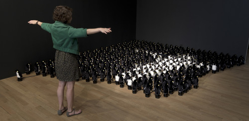 An Interactive Mirror Built From 450 Rotating Penguins By Daniel Rozin