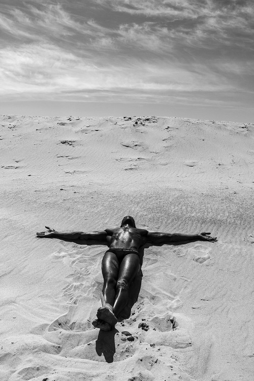 chriscruzism:  Model Chris Lylez represented by Silver Models and photographer Gregory Prescott come together for a super come back. Exuding a raw sensuality, a lean Chris hits the sand, modeling classic CK brief underwear in a black and white