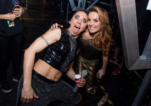 Geri Halliwell (Ginger Spice) and Melanie C (Sporty Spice)- Spice Girls