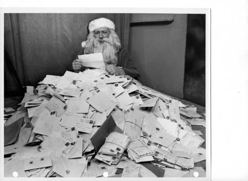 onceuponatown:New York.  Santa Has an Emotional Crisis, Schenectady, 1953. Snowed under with more 