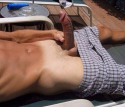 properfaggot:  Apparently sunbathing gets this stud worked up. He wouldn’t need to ask me twice to worship his hot cock.  http://ezuv.tumblr.com