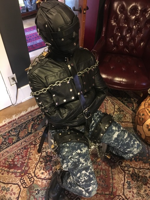seabondagesadist:  A sailor finds himself in the Navy chair for an afternoon of bondage and captivity!  Strapped into a straightjacket, locking restraints, twenty feet I’d chain and thirty padlocks. The first four hours he spent hooded and held captive