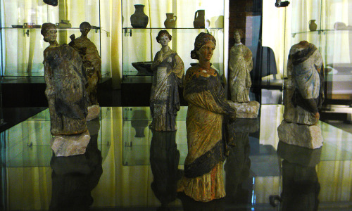 Archaeological Museum - Tanagra Figurines characteristic for the Greek world in late 4th century BCE