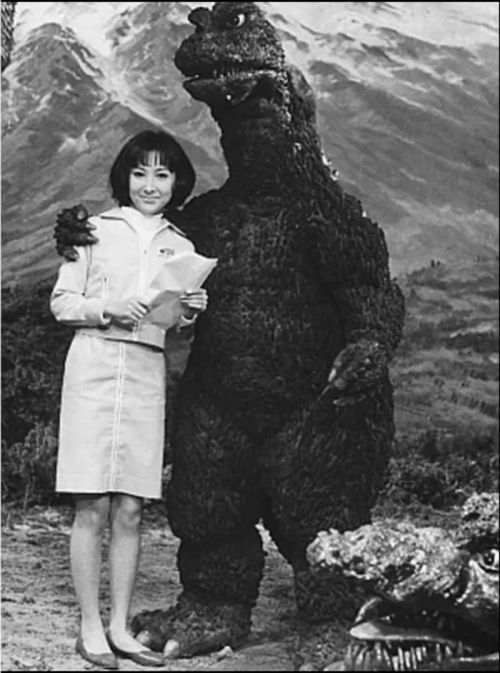 chernobog13: Godzilla posing with the lovely Yukiko Kobayashi, with Manda photobombing, on the set o