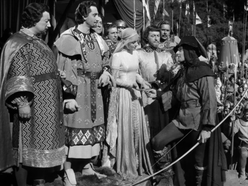 Robin Hood (1938) - Olivia de Havilland and Errol Flynn after the archery contest. This movie is wit