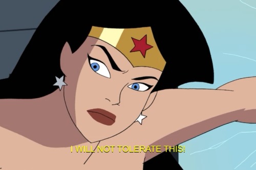 imsuggestingcoconutsmigrate:   pelosdegato:  ianthe:  Wonder Woman is having none of your shit today.  THat reflection is so fucking wrong…  Wonder Woman is so unimpressed her expression can go in two directions at once 