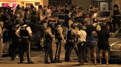 think-progress:White Armed Militiamen Appear In Ferguson After State Of Emergency DeclaredOne year a