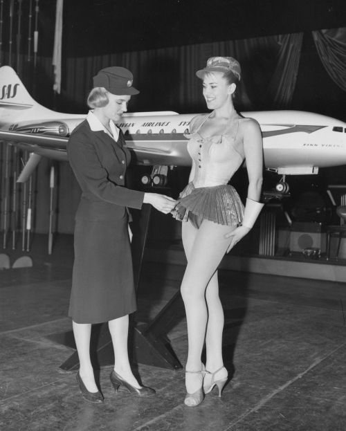 toneburst: A Scandinavian Stewardess examines a new uniform proposal for Scandinavian Airlines in 19