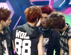  after finishing the mini chick game, xiumin noticed something on luhan’s face