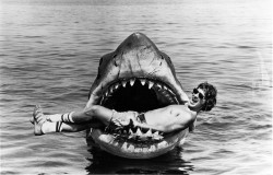 historicaltimes:  Steven Spielberg lying in the mouth of “Bruce the shark” on the set of Jaws. 1975 