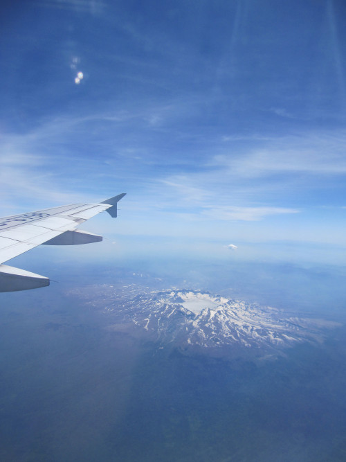 phoebe88phoebe:  When we flew over Tianchi Lake/ Changbai Shan Mountain 飞过长白山时有幸看到了天池
