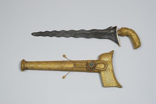 Sumatran Kris, with gold plated sheath and turquoise stud, early 19th century.from The State Hermita