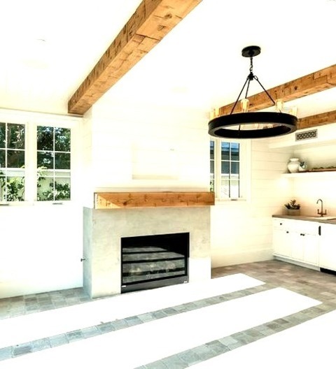 Game Room In Los AngelesExample Of A Large Cottage Enclosed Limestone Floor And Gray Floor Game Room