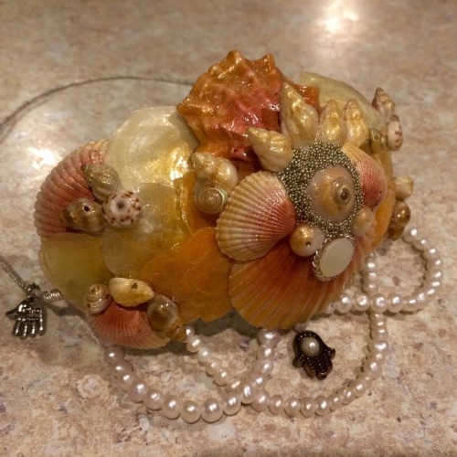 Crown of shells, made from silver wire, mother of pearl, hawks eye cabochons, fresh water pearls, an