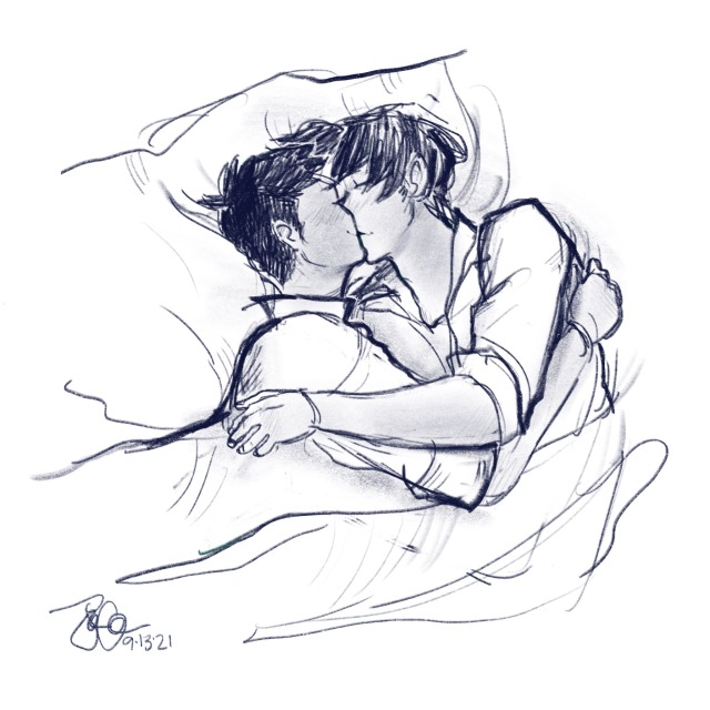 Naruhodou Ryuunosuke amd Asougi Kazuma sharing a kiss in bed. Ryuu's face is hidden from the viewer. They both have their arms around each other.