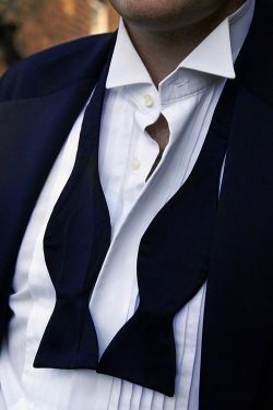 One of my favorite things in the world is when men do this with their bow ties. I melt.