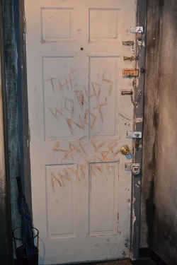 brittykitty2:  I’ve always seen this photo floating around the web, but I’ve always wondered if there’s a story behind it. It’s either the door of someone who suffered a horrible life and went insane and did this, or, it was created as an art