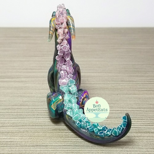 battlecrazed-axe-mage: bon-appeteats: Custom order for a peacock colored dragon with crystals. Swipe