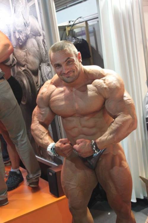 sannong:    Tomas Kaspar - Part 1: Stage Shots. Holy fuck! The bulging road map veins covering every inch of his beautifully mutated legs, the monstrous, deeply striated and ripped traps, the shredded sucked in bodybuilder face that just scream raw power.