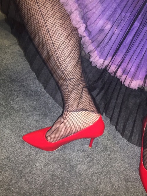 His legs, fishnets, petticoat and dress. His happy place!!!