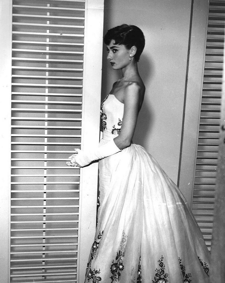 AUDREY HEPBURN IN GRAYSCALE — Audrey Hepburn wearing her iconic Givenchy  evening...