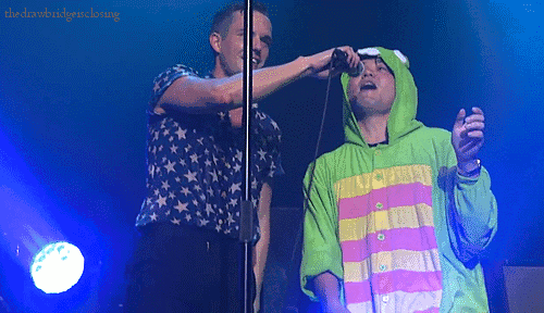 thedrawbridgeisclosing:  Cool guy dressed up like Gachapin during Read My Mind at Japan (video from Crystal_KILLERS) 