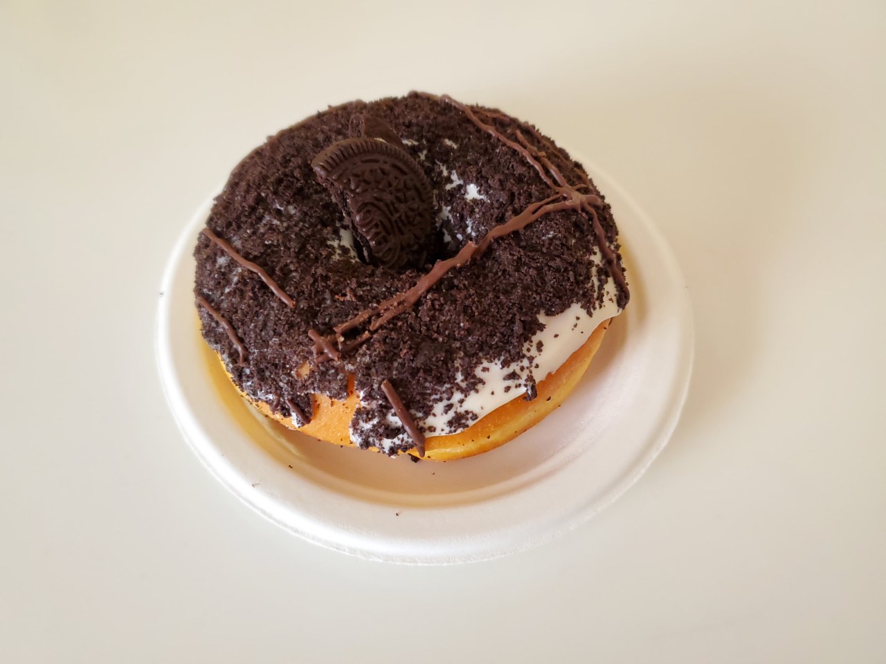 OH MY OREO doughnut from Destination Doughnuts. - Sponsored by my company bcos we did “well” as a “company” so it was like a staff appreciation thing. Pretty sure this was my 1st experience with this doughnut place. .. & I’m pretty sure it’ll likely be my last? Or at least, I don’t know. .. if my company does another thing like this, I’ll likely give mine away. Why? I love Oreos - so the topping portion was great! The doughnut itself was pretty gross to me =/  maybe “real” doughnuts are supposed to be like this texture but my palette is too accustomed to the cheap Timmies’ doughunts. .. I like the soft, foamy, ‘hollow’ .. type of doughnut, you know? The texture of this one was like. .. maybe 40% of that of a bagel??? It was so dough-y & off to me. It was also kinda yeast-y in flavour, which I do not like at all. It was really weird. I don’t know how others feel about it but from my work ‘group’, it seemed like everyone was a fan. So I don’t know, maybe it’s just me haha #food#doughnut#donut#destination doughnut#oreo#sweet