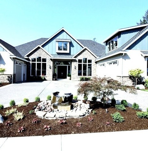 Transitional Exterior - SidingHuge Transitional Multicolored Two-story Mixed Siding Exterior Home Idea