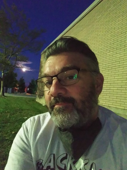 Just me and my buddy, the moon, enjoying dinner on a cool summer evening