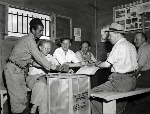 A YEMENITE MAN VOTES AT KISSALON MAABARA - THE FIRST TIME IN HIS LIFE THAT HE HAD VOTED; 1951. x