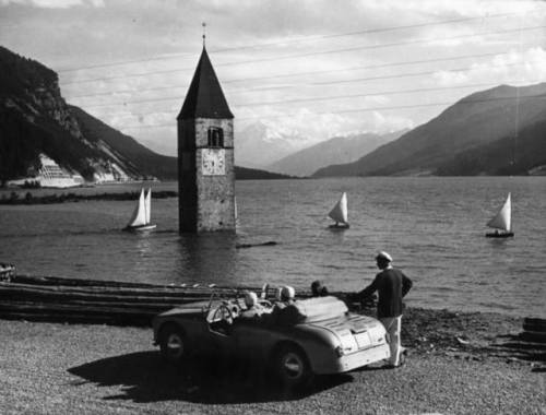 The Reschen Lake in southern Tyrol, which covers the sunken village of Graun, on August 13, 1953.