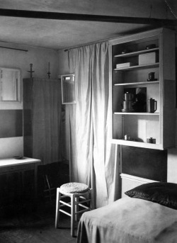 lamignonette:A Corner of Mondrian’s Studio with Bed, Stool, Curtain, and Mirrors, Gelatin silver print, Photography by André Kertész, 1926.