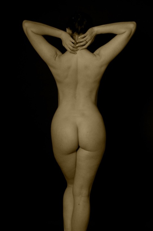 standing nude in sepia tone