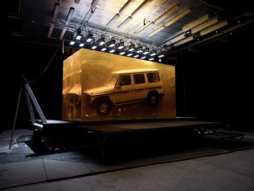 1979&rsquo;s g-class mercedes‑benz inside an amber-colored cube at naias