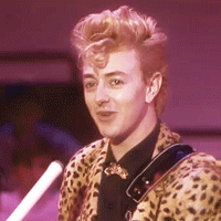 setzabilly:  I actually can’t get over Brian’s face…even while making a silly