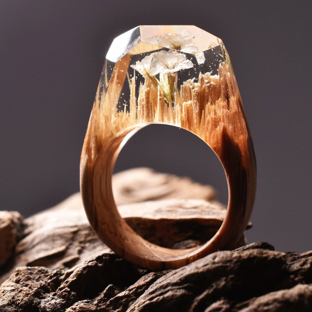 itscolossal:  New Ethereal Worlds Encapsulated In Wood and Resin Rings