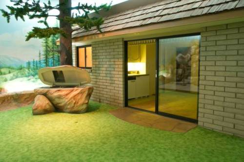 sixpenceee:This cold war era bunker was built 26 feet underground and equipped for a family to live in for a year in the event of a nuclear missile strike. It’s a virtual relic of 1970s suburbia, complete with a “backyard,” swimming pool, two-bedroom