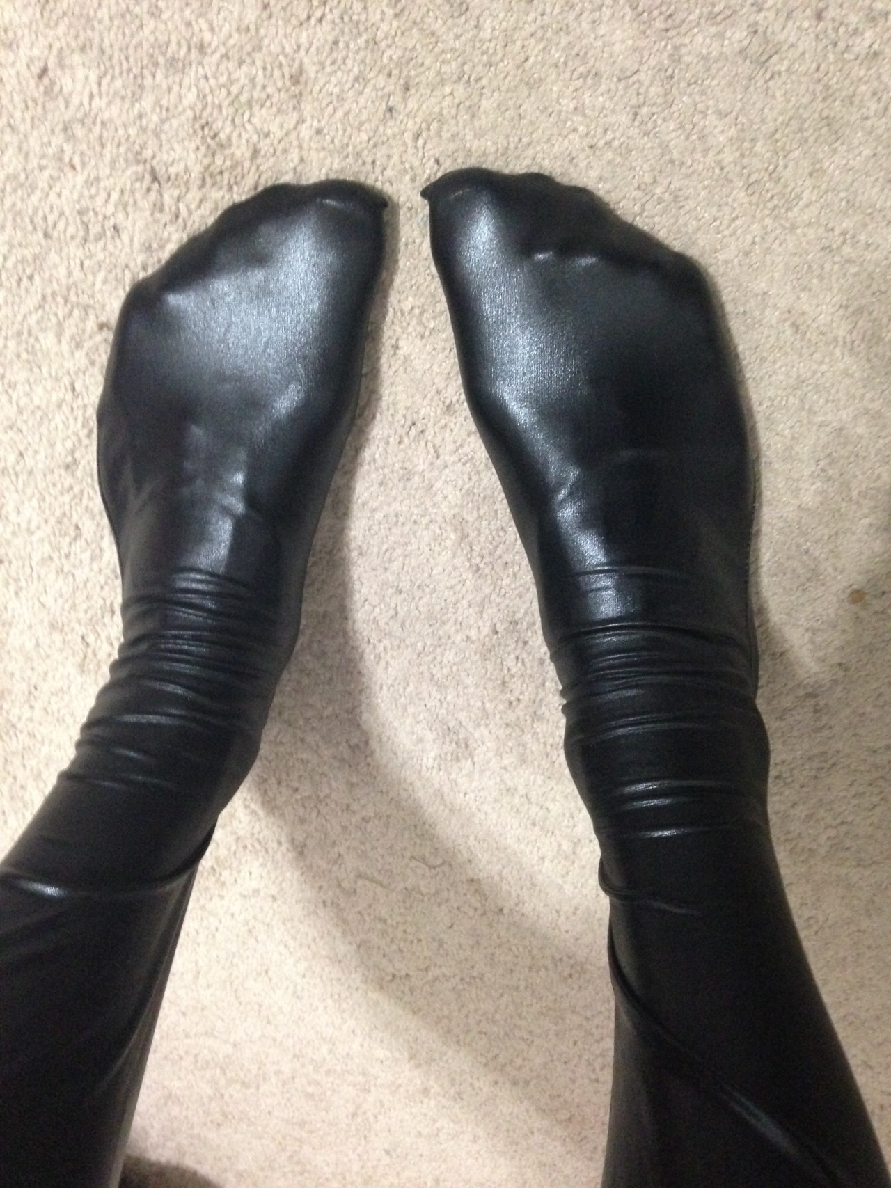 bunnyb0i:  I got some new thigh high wet look socks, I love the way they look with