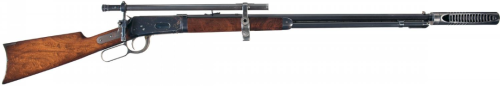 Unique Winchester Model 1894 lever action takedown rifle with scope and silencer, produced in 1907.