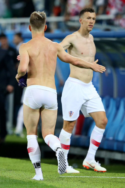 neveerlandworld:Ivan Rakitic of Croatia is left with wearing little clothing after giving his kit aw