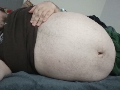 earthyjim:bigbellyct:Celebrated Pi day. Bloated and beached on the bed. Time for