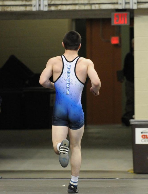 wrestlersandsinglets:  Follow me for Hot Wrestlers in Sexy Singlets =)  Fleeing the scene after eating the competition
