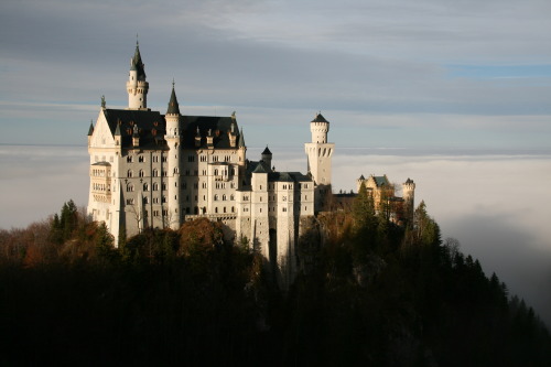 travelingcolors:  Looming over the small Bavarian town of Hohenschwangau are the turrets and towers of one of the world’s most famous “fairytale” castles. Schloß Neuschwanstein, or “New Swan Stone Castle”, was the fantastical creation of King