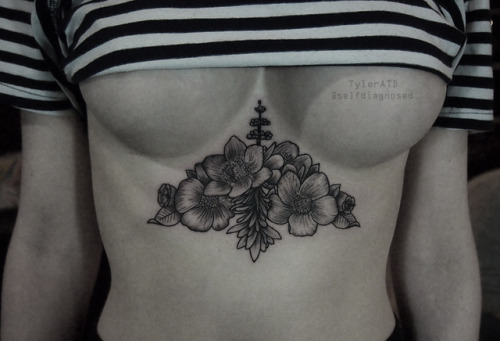 Porn fuckyeahtattoos:  Flower sternum tattoo by photos