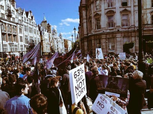 ashowott:  So this is currently happening in the UK.  There is a #ToriesOut protest taking place outside 10 Downing Street, as well as Piccadilly and Westminster. People are disgusted by the new Cameron government.  There is heavy police enforcement.