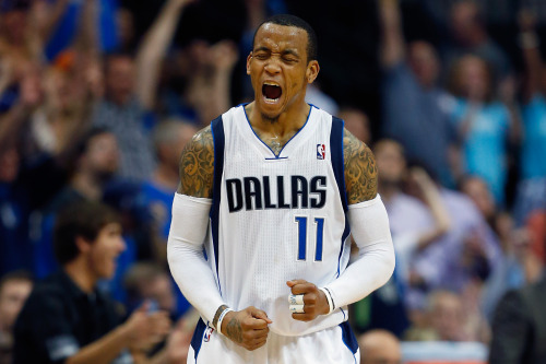 nba: Monta Ellis of the Dallas Mavericks reacts after scoring against the Phoenix Suns in the third 