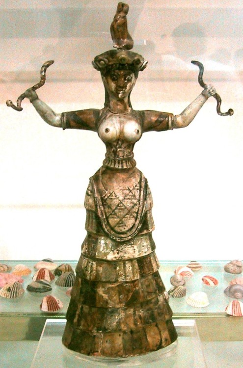Snake Goddess from the palace at Knossos, Crete, Greece. 1600 BCE, Minoan.  faience pottery; fired a